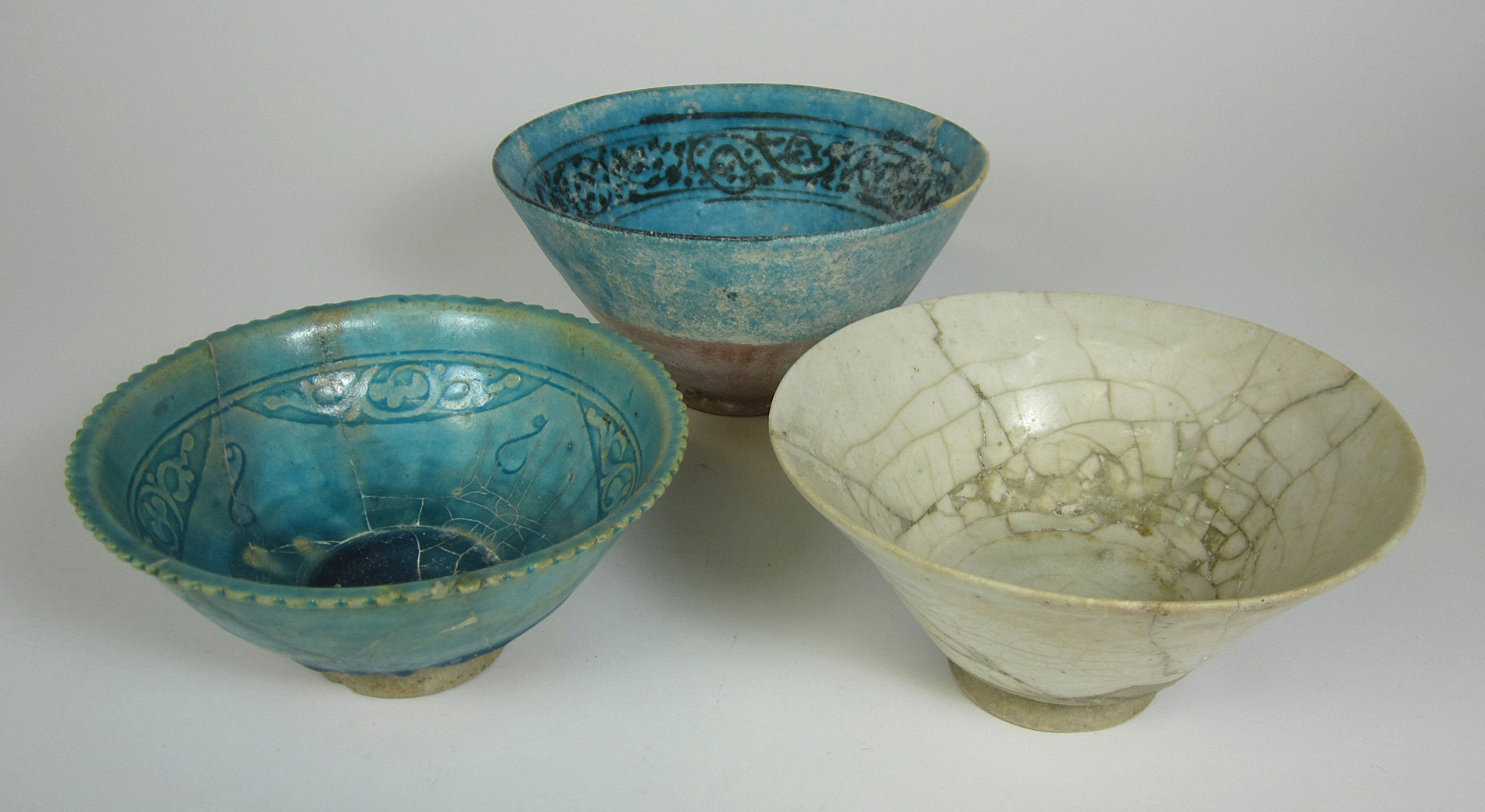 TWO EARLY PERSIAN TURQUOISE GLAZE POTTERY BOWLS