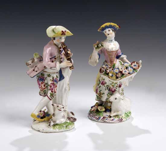 A Bow figure of a pipe playing shepherd and his companion