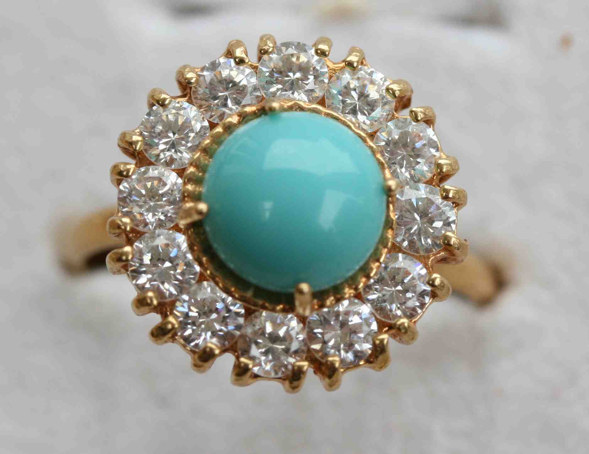 A group of gem set rings to include