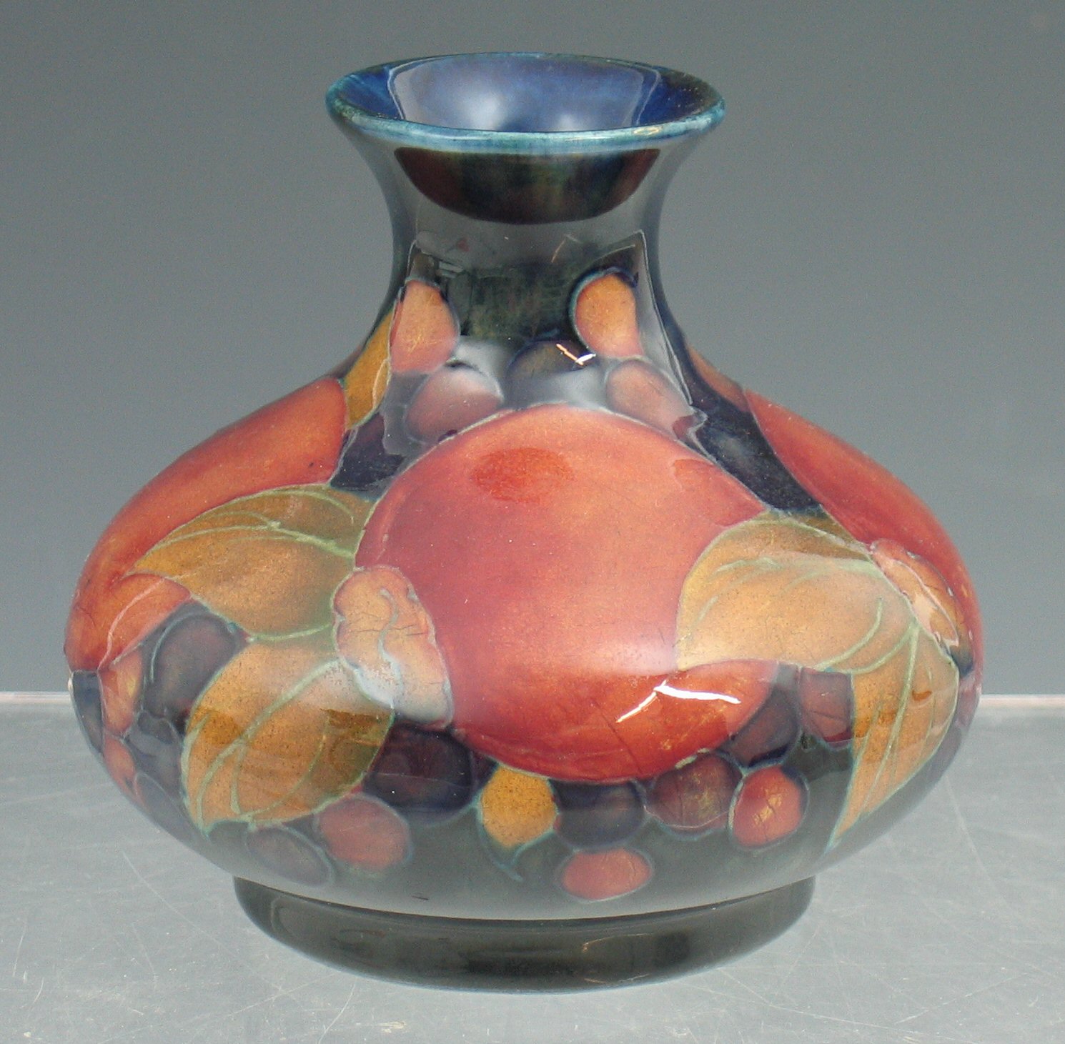 A Moorcroft miniature vase,