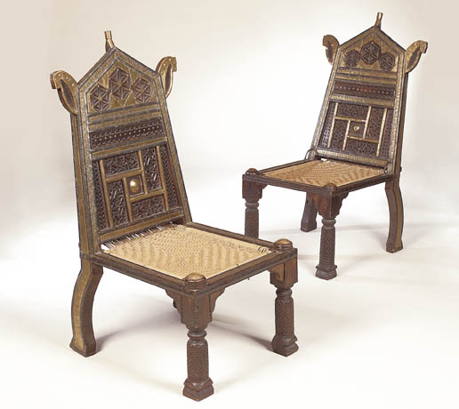 A pair of Indian hardwood thrones,