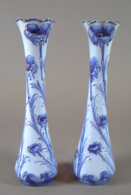 A pair of Florian Ware tall tapering vases