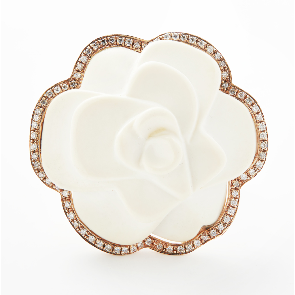 A white onyx and diamond set ring