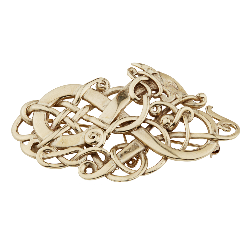 OLA GORIE - A LARGE 9CT GOLD BROOCH