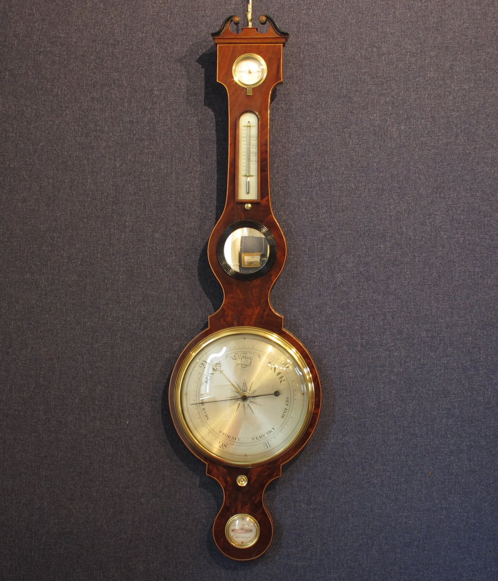 An early/ mid 19th century mahogany wheel barometer By J. Comoli, Edinburgh