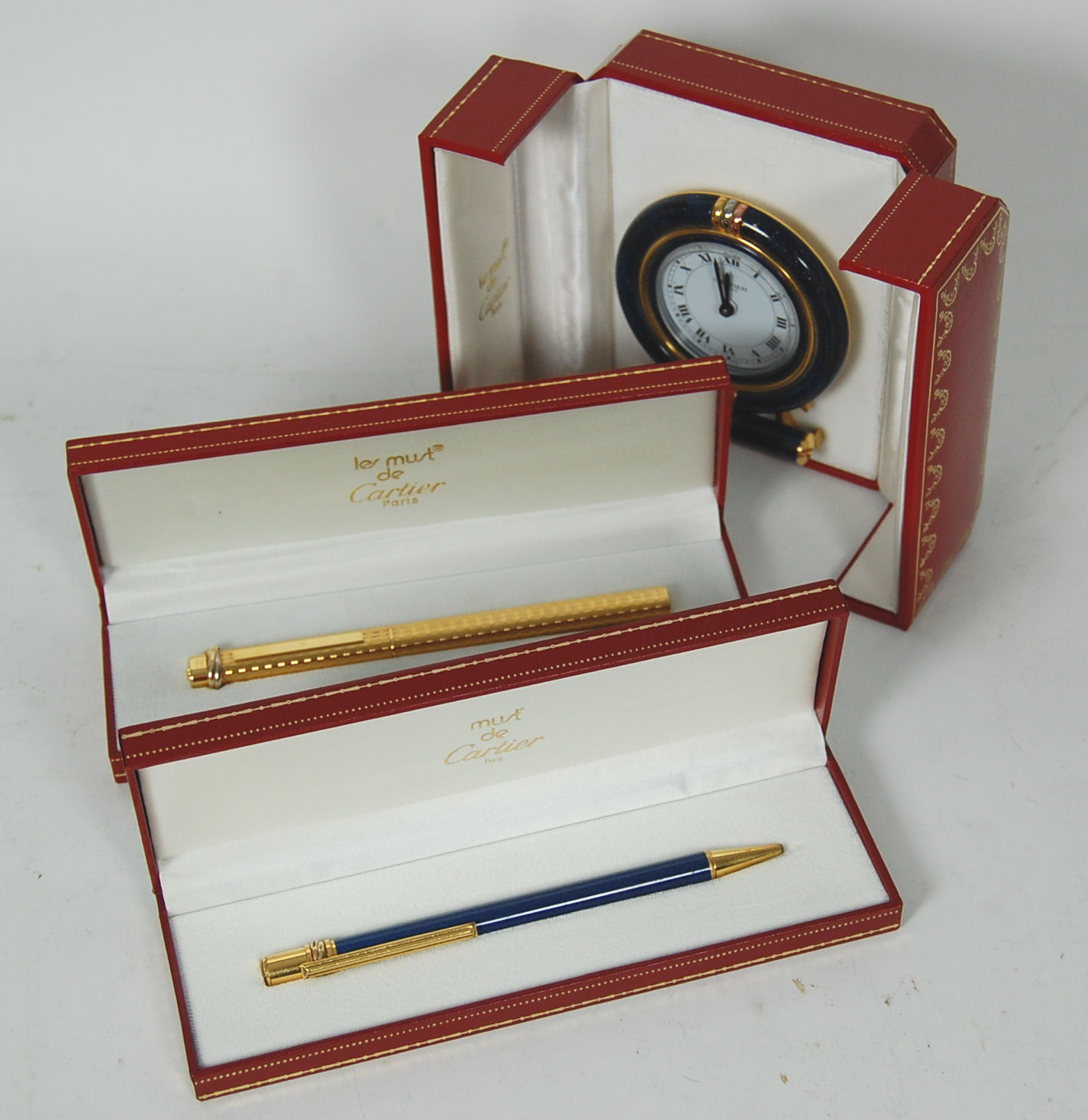 CARTIER - a deep blue enamelled timepiece,