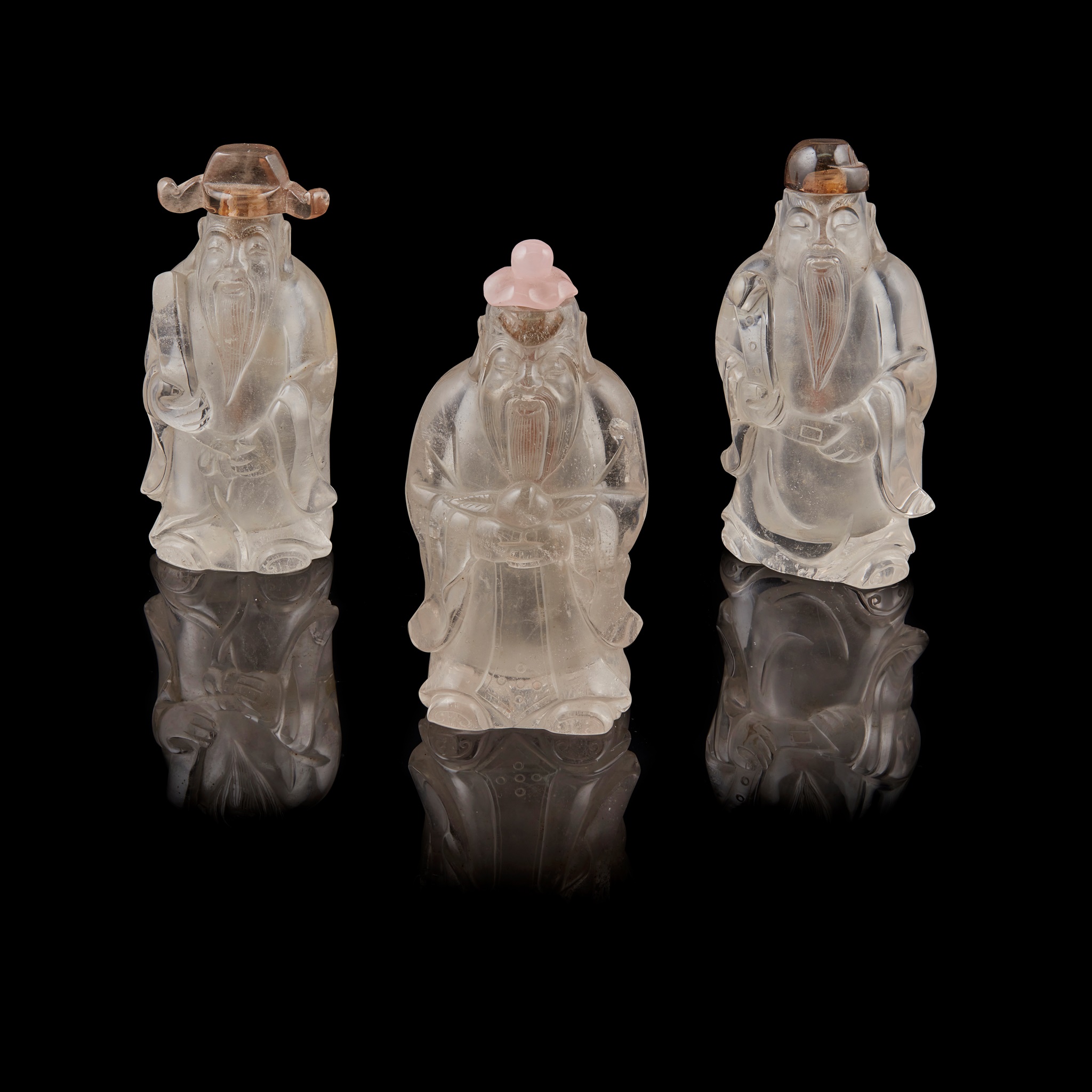 GROUP OF THREE ROCK CRYSTAL SNUFF BOTTLES