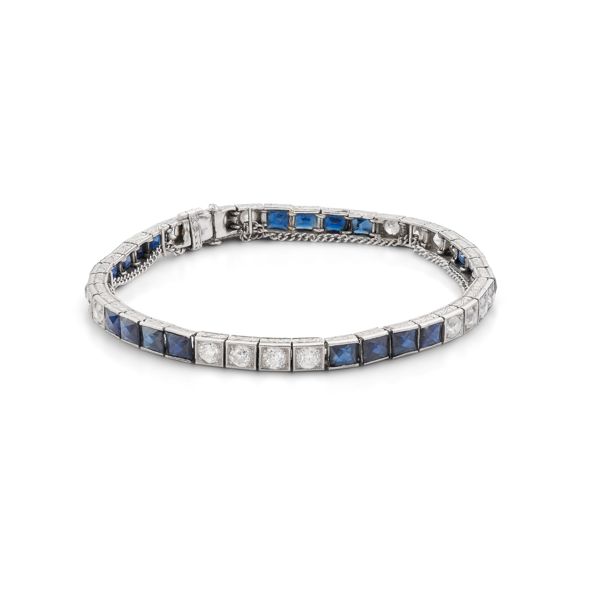 A sapphire and diamond tennis bracelet, first half of the 20th century