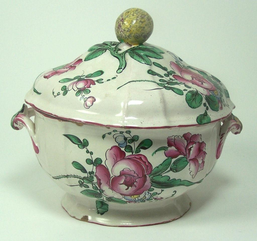 An 18th century French faience tureen and cover