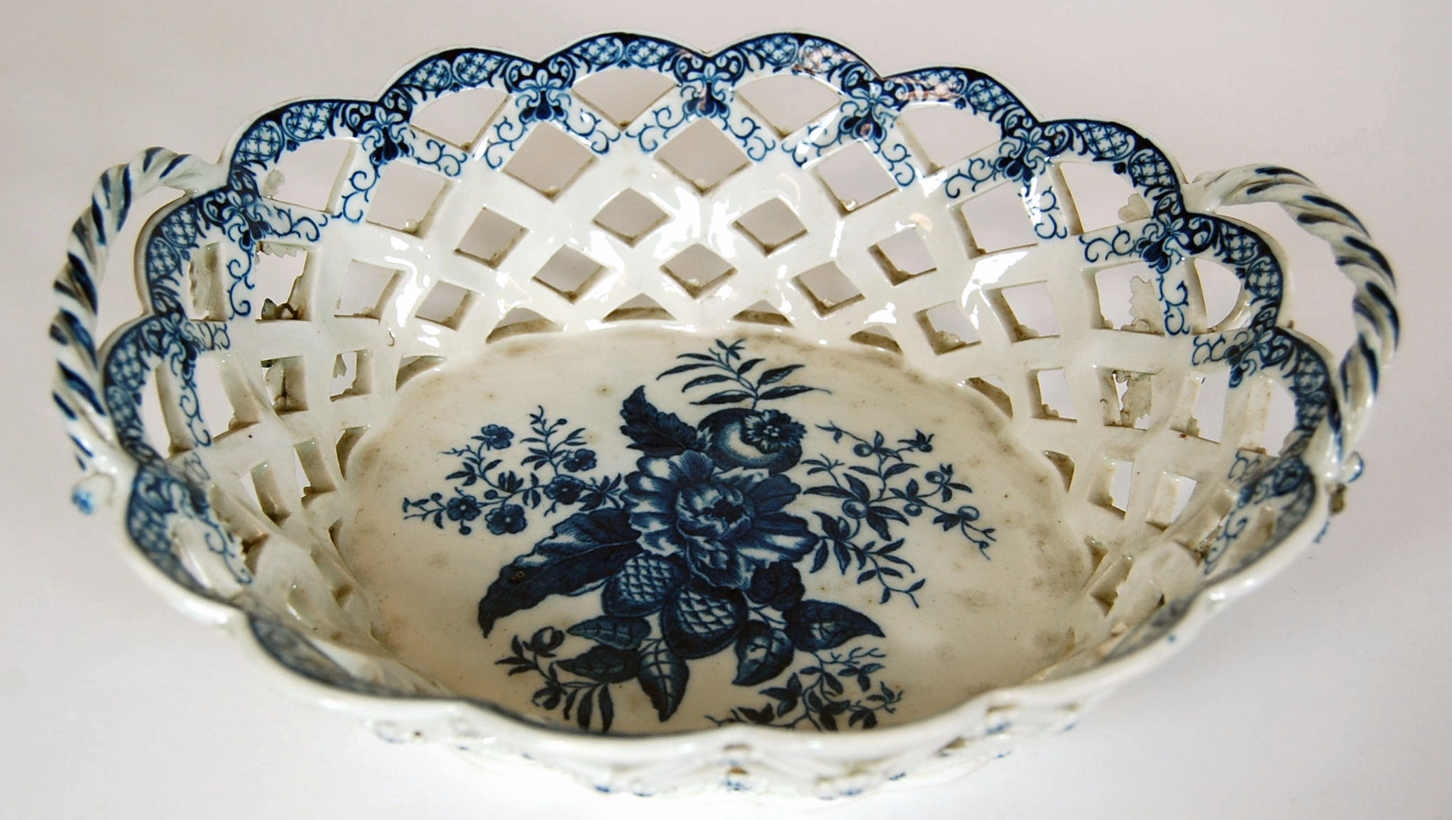 A large First period Worcester pierced oval twin handled basket