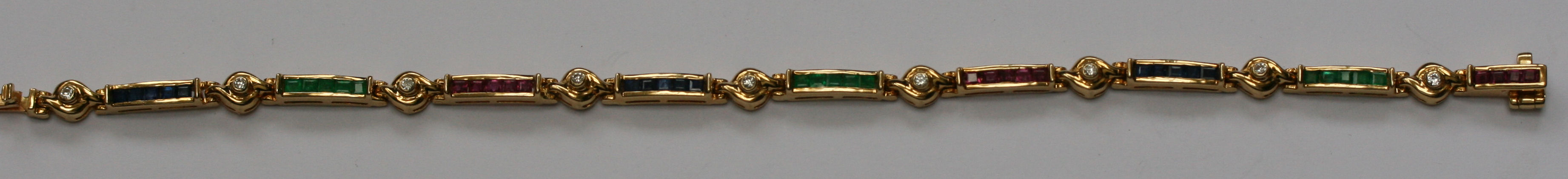 A gold multi gem bracelet