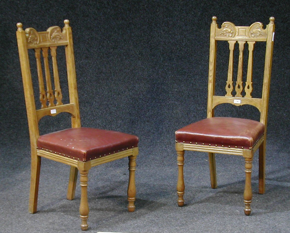 A set of six oak dining chairs,