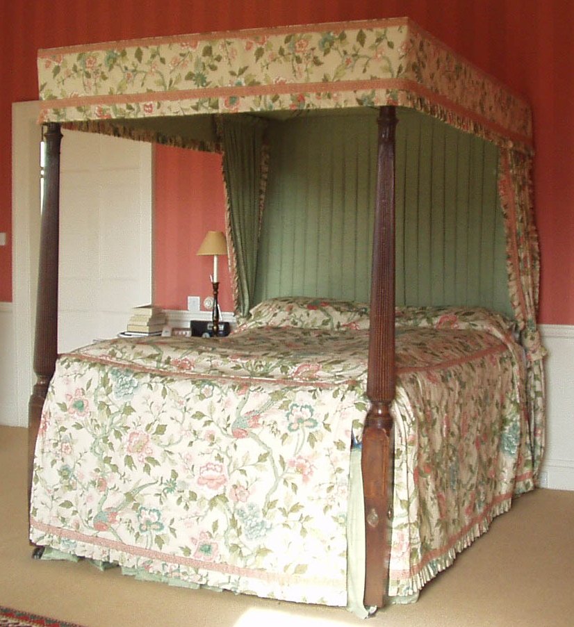 A mahogany four poster bed