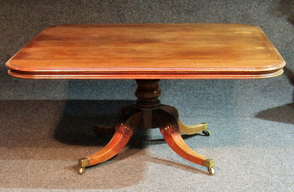 A George IV mahogany dining table,