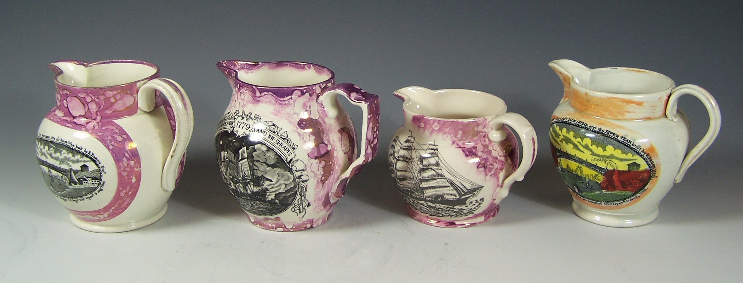 Three Sunderland lustre ware jugs,