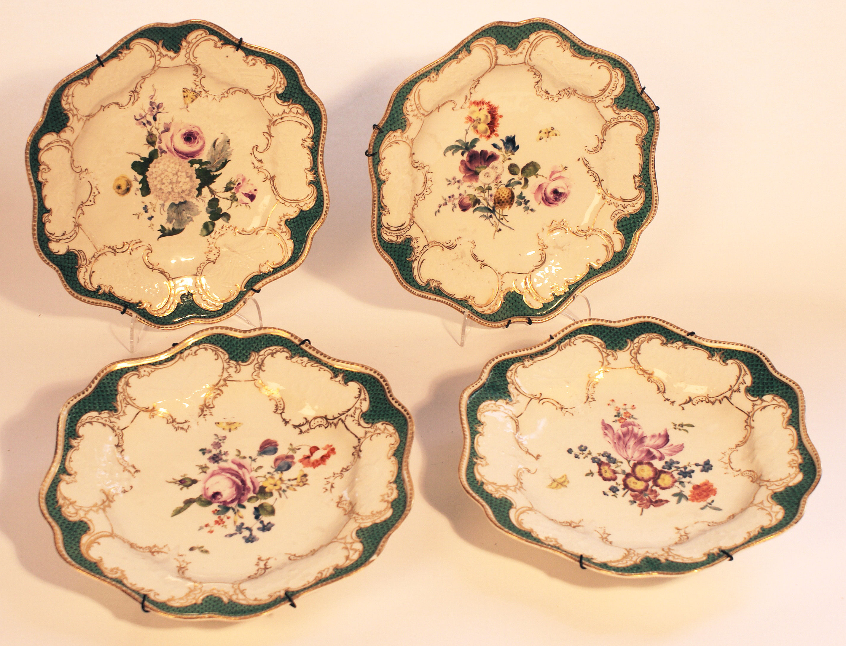 SET OF FOUR CIRCULAR SCALLOPED MEISSEN PLATES