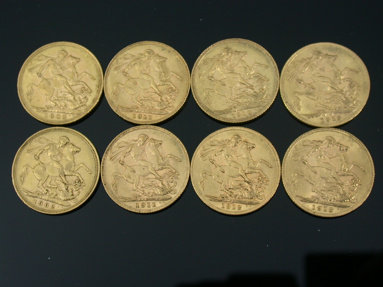 Eight assorted Sovereigns,