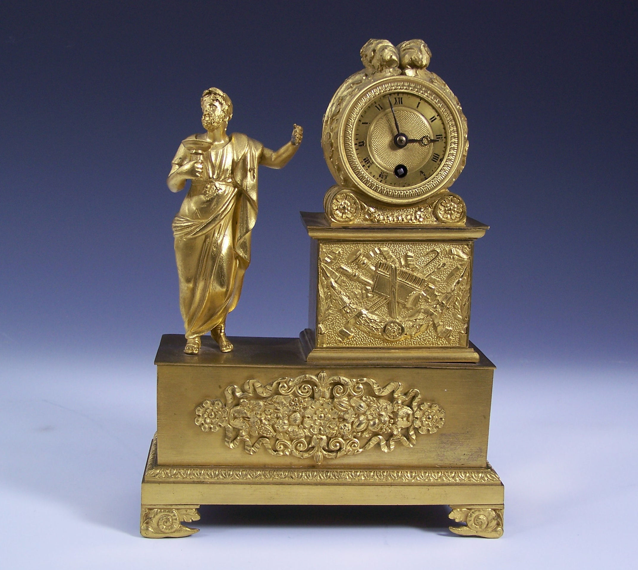 Villemsens a Paris A 19th century Empire style gilt-brass timepiece,