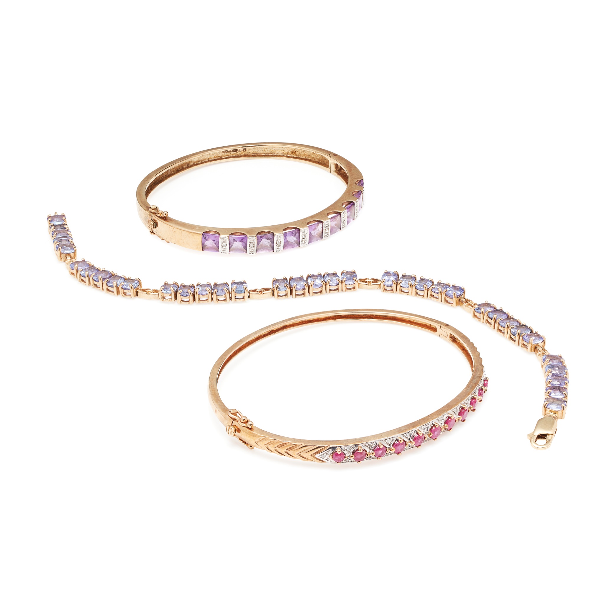 A collection of three gem set bracelets