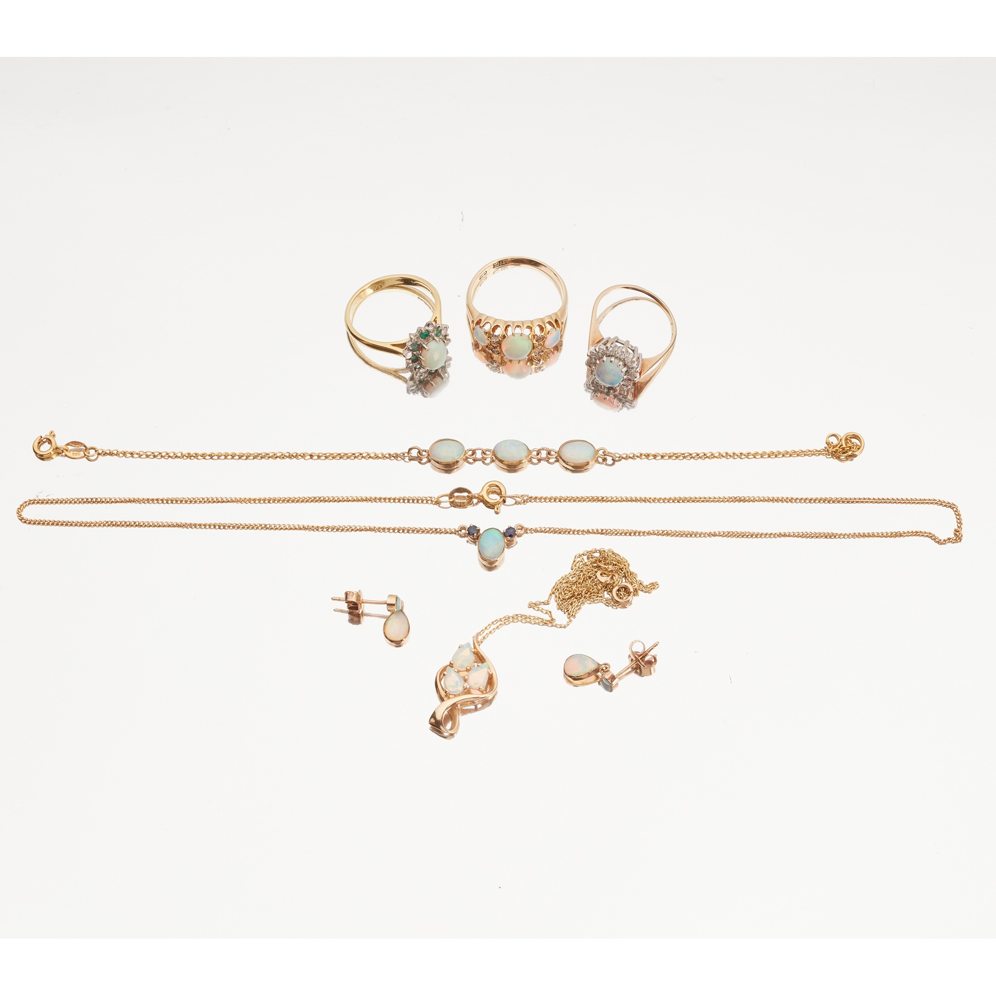 A matched suite of opal set jewellery