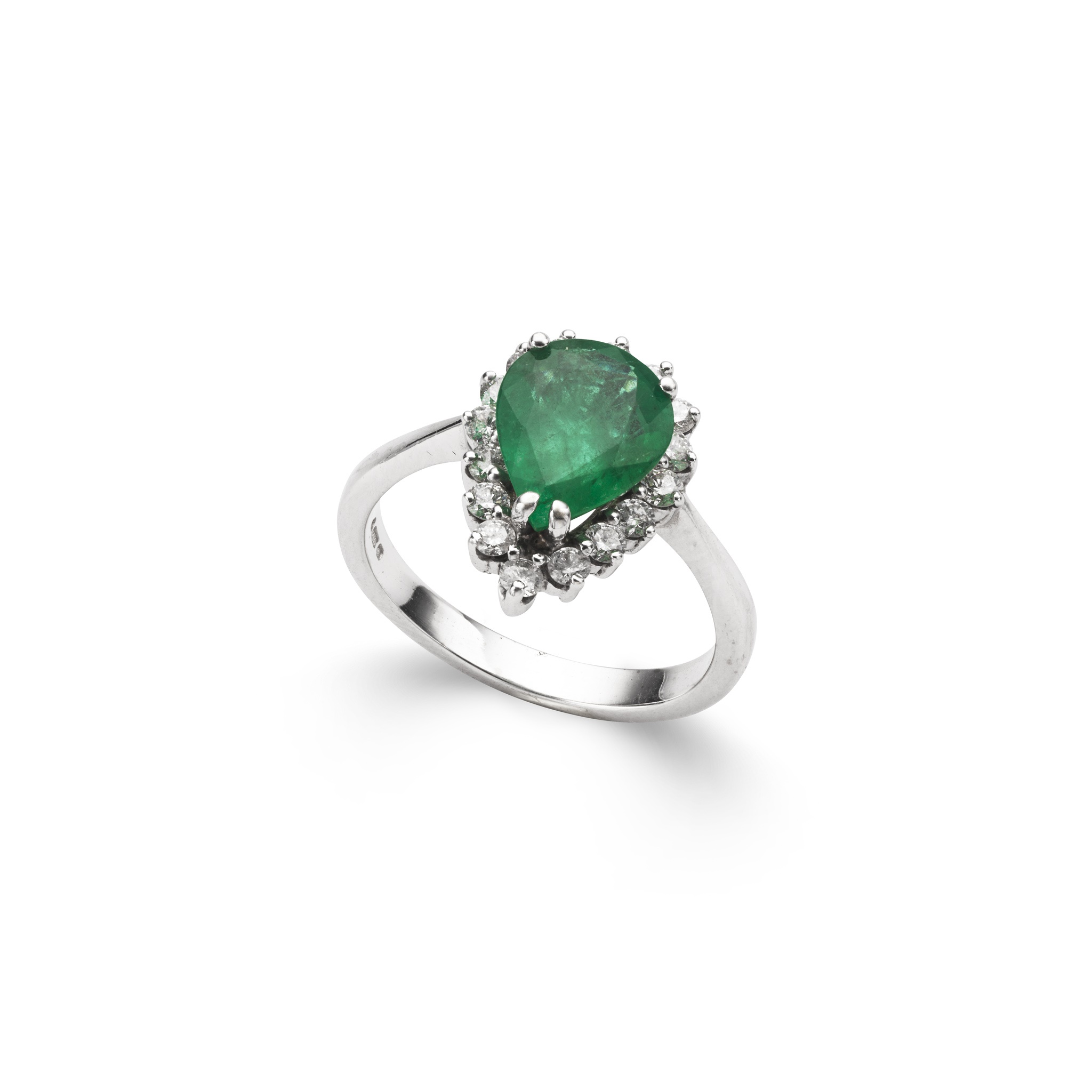 An pear-shaped emerald and diamond cluster ring