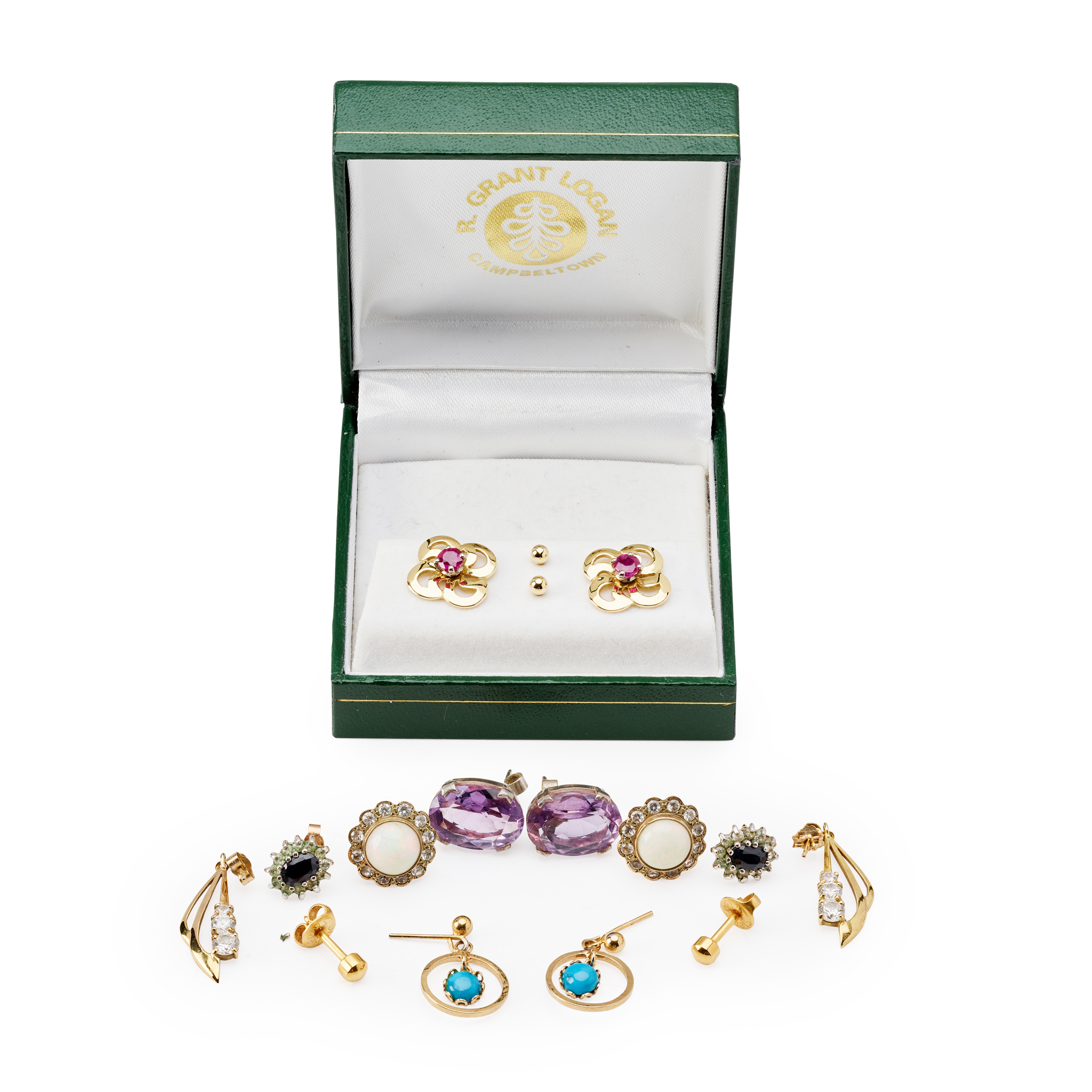 A collection of gem set earrings