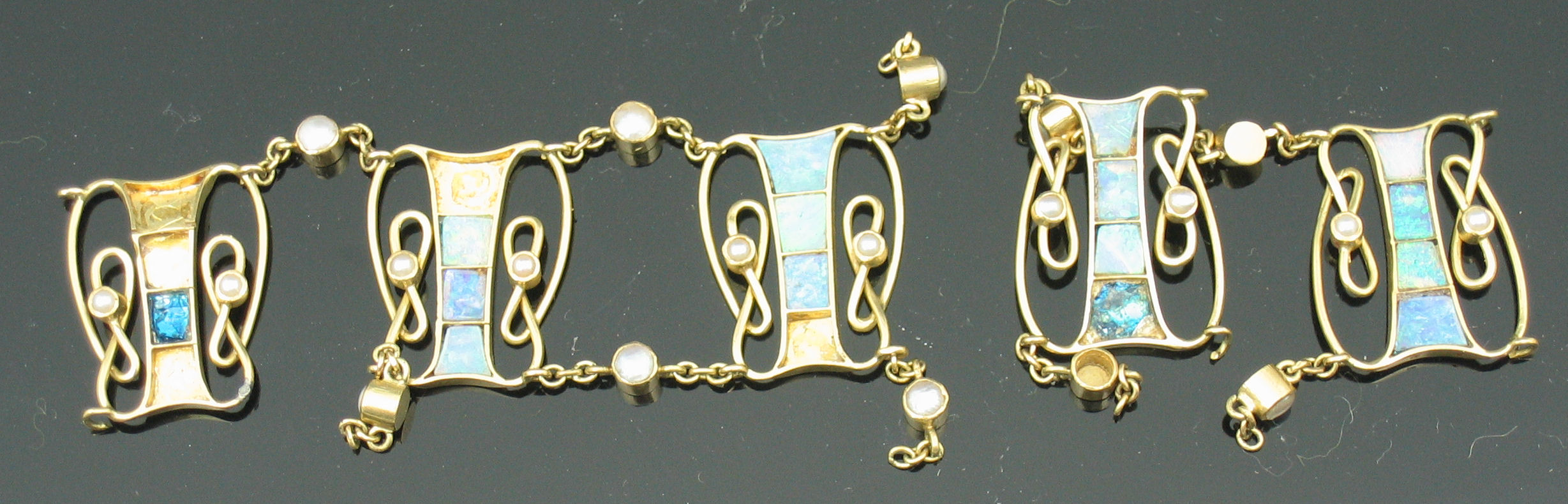 An Art Nouveau opal and seed pearl set bracelet,