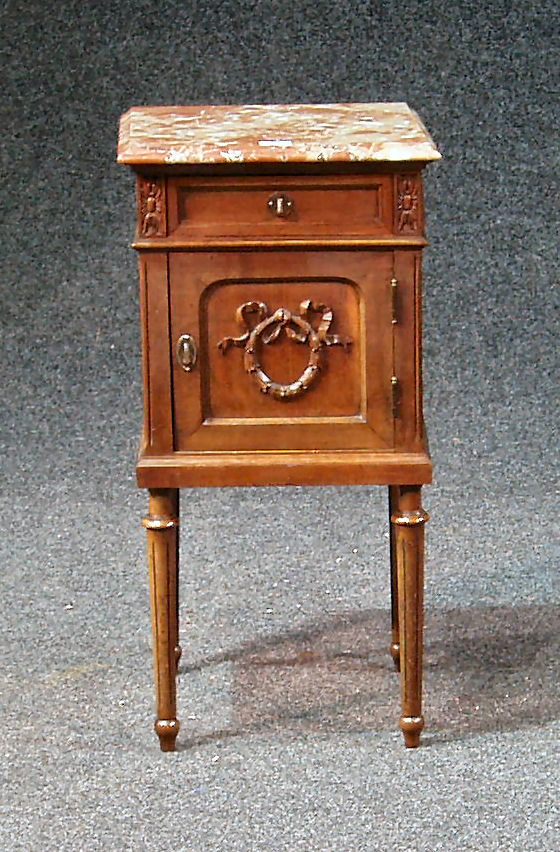 An Edwardian marble top mahogany bedside cabinet,