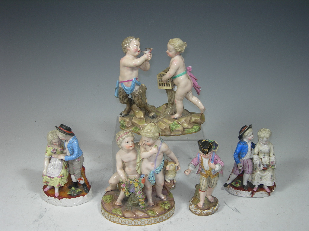 A group of three Meissen style figures