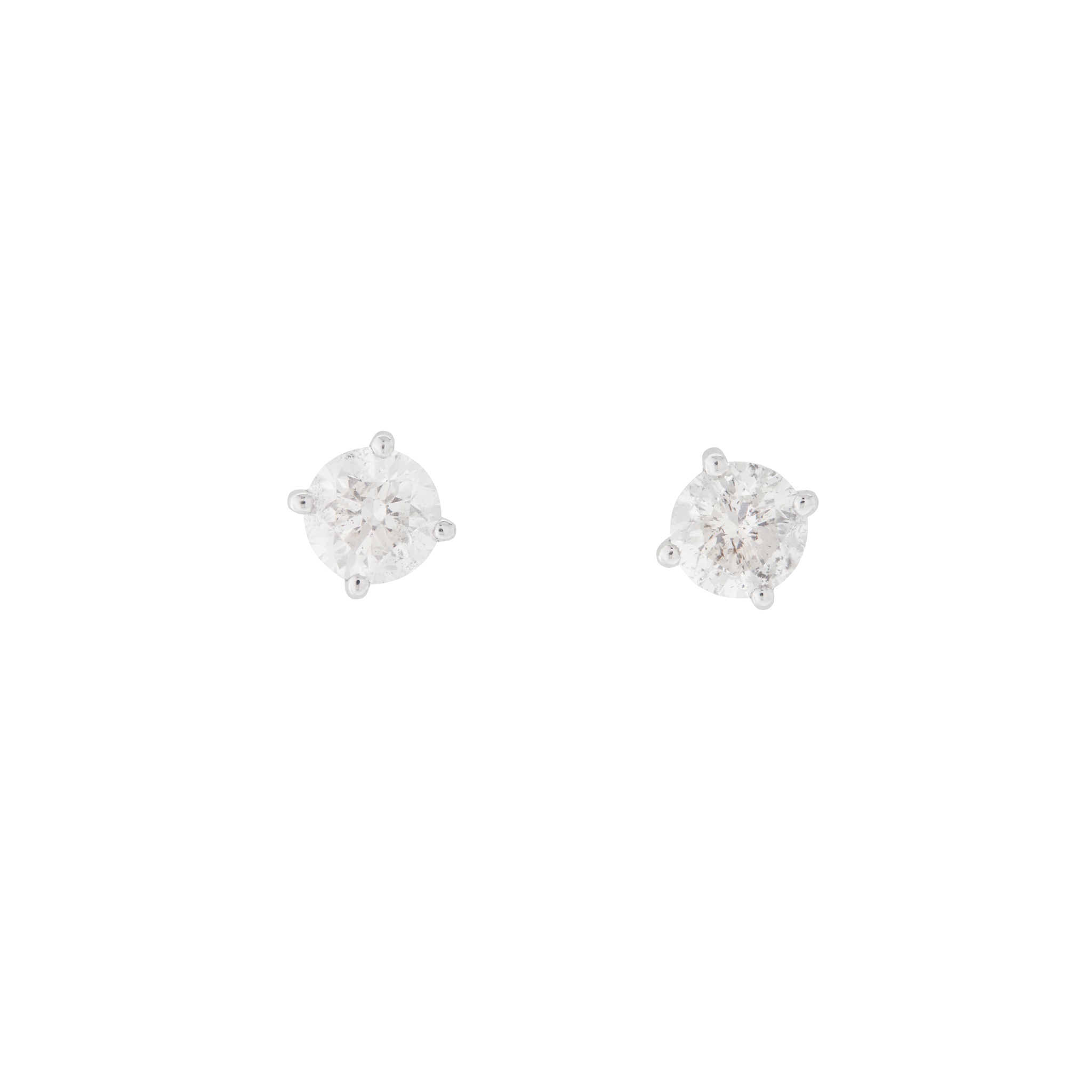 A pair of diamond stud earrings