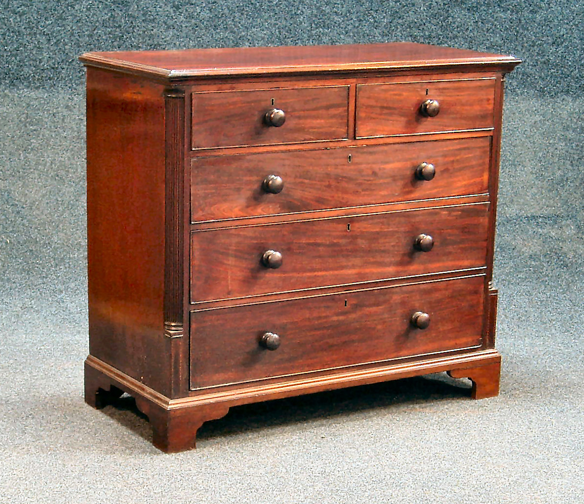 An 18th century mahogany chest,