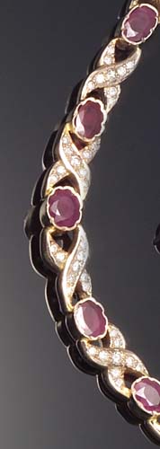 A continental gold ruby and diamond necklace,
