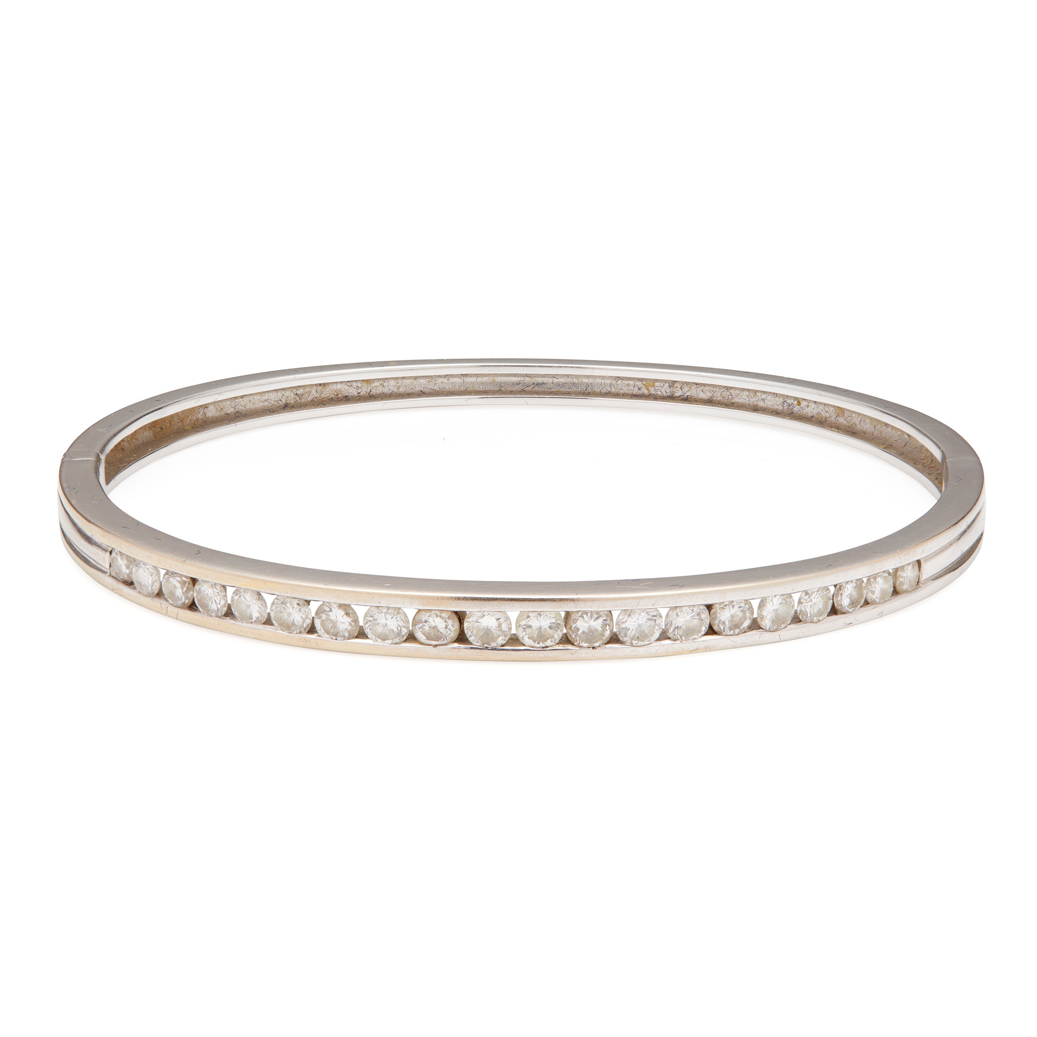 A 18ct white gold diamond set bangle