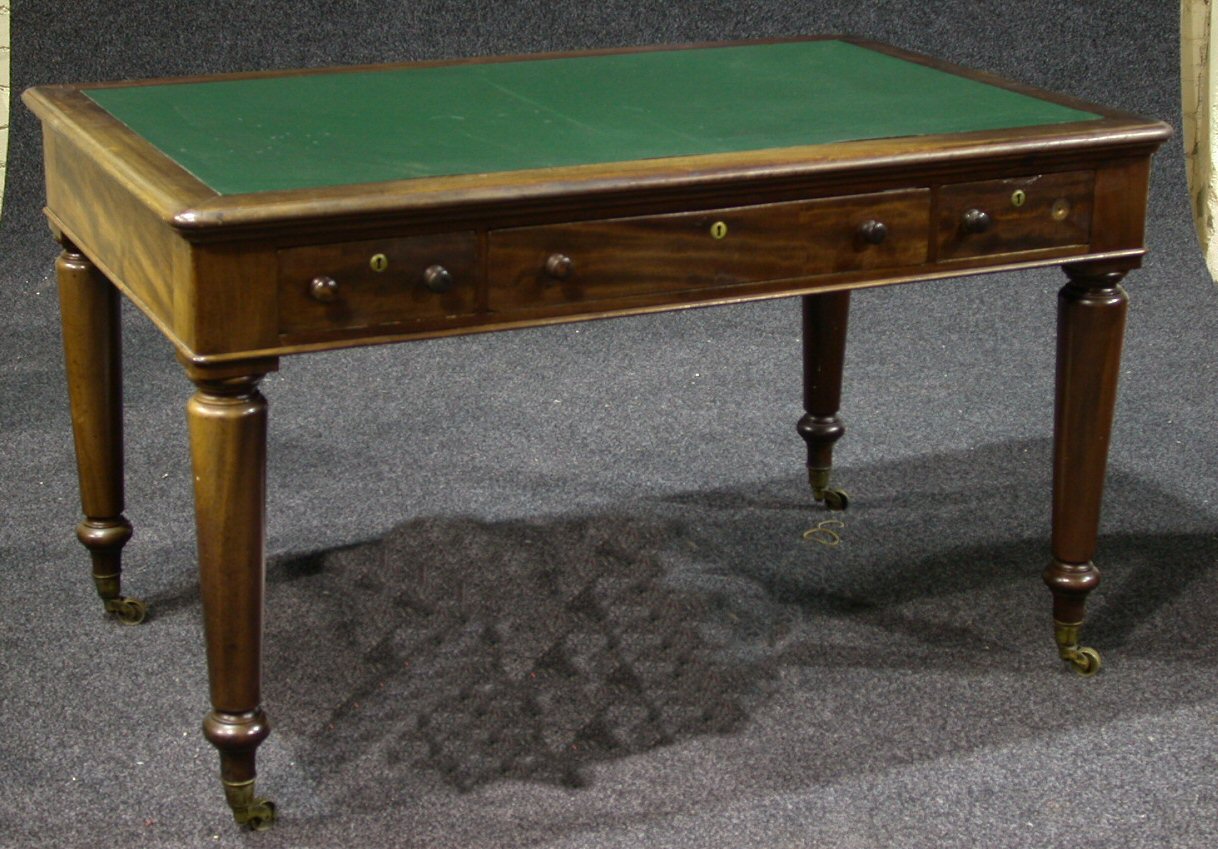 A Victorian mahogany table desk,