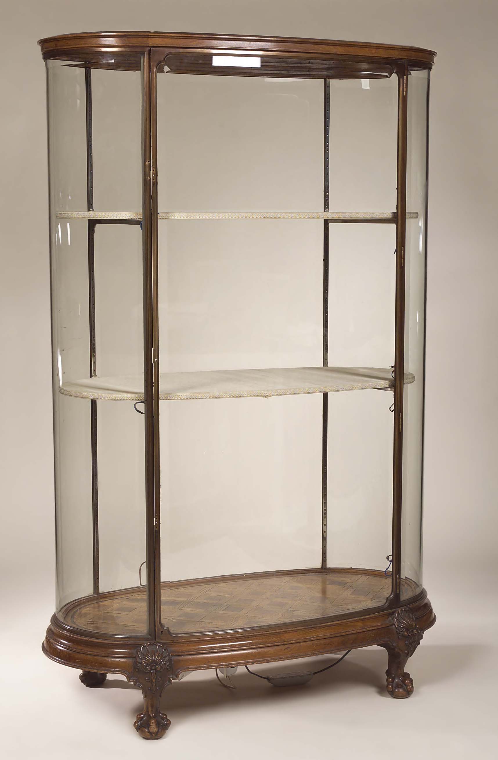 An early 20th century walnut display cabinet,
