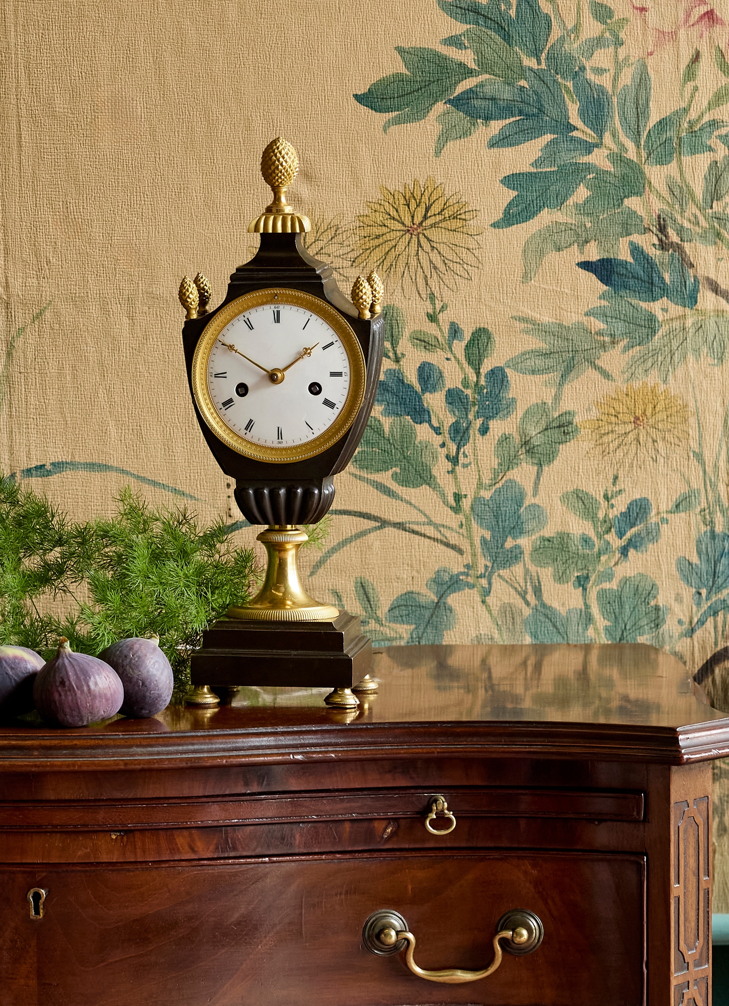FRENCH DIRECTOIRE PERIOD GILT AND PATINATED BRONZE MANTEL CLOCK