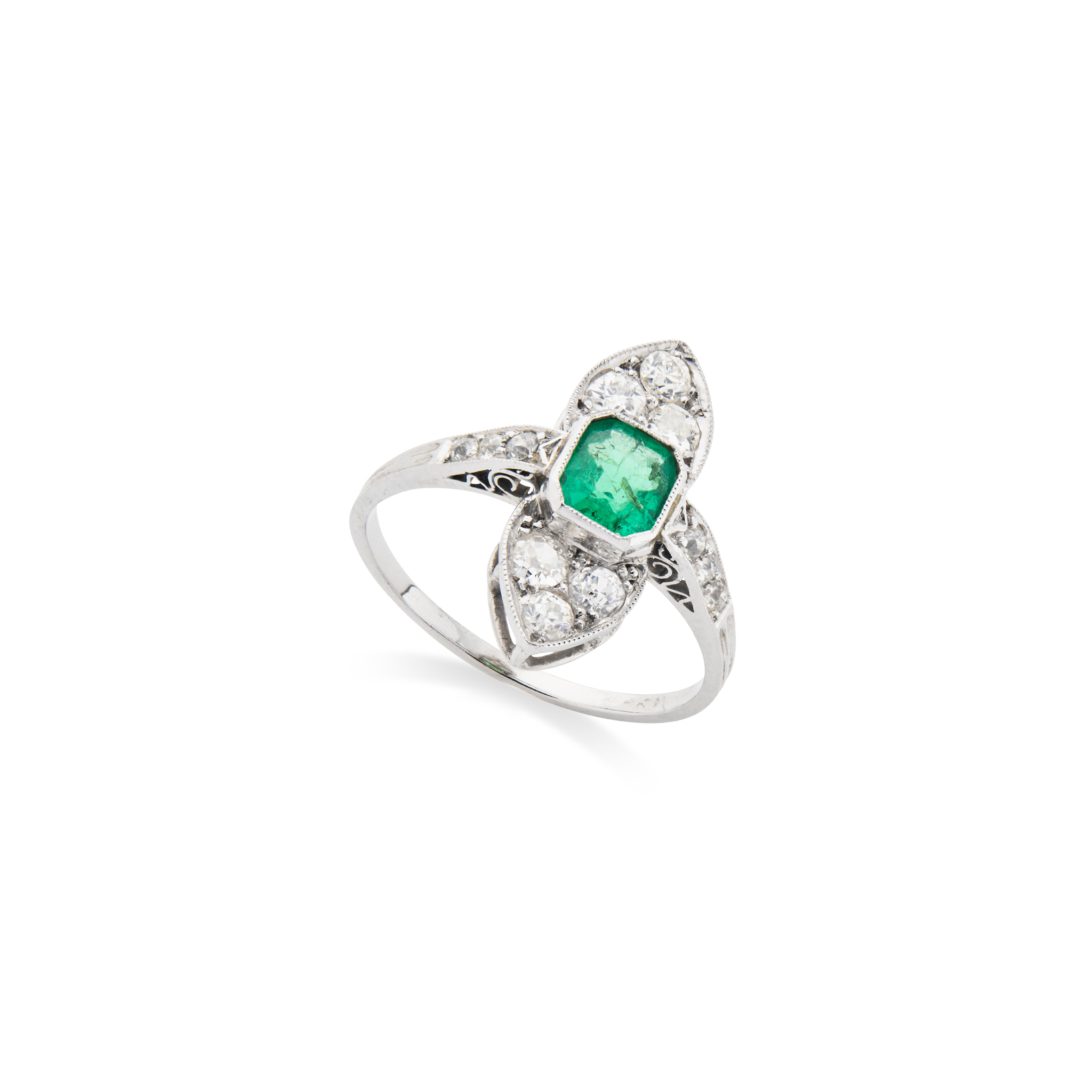 An emerald and diamond dress ring