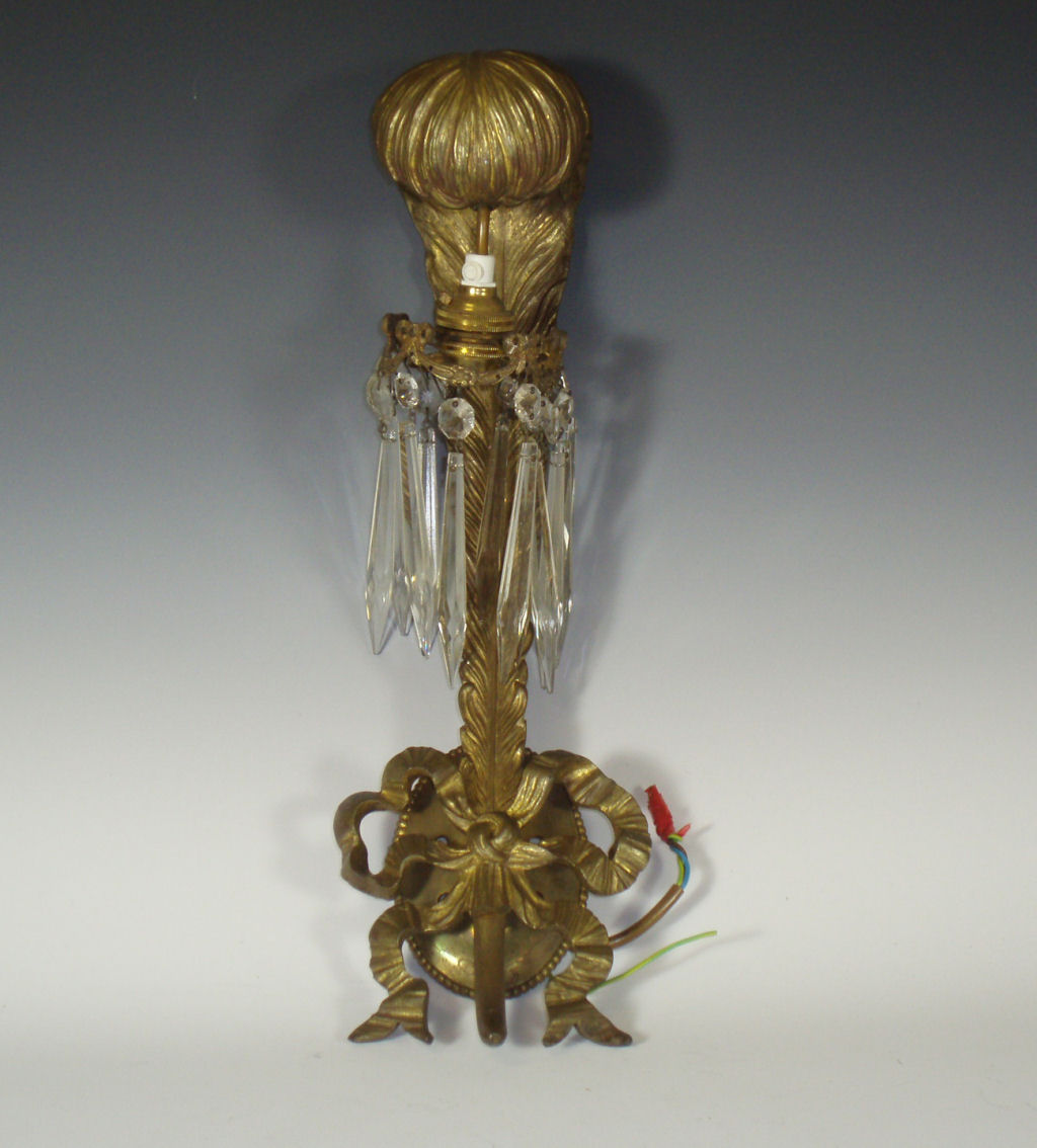 A set of four late 19th century gilt bronze wall lights