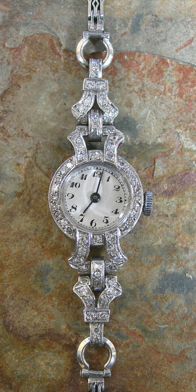 An early 20th century lady's platinum and diamond set cocktail watch,
