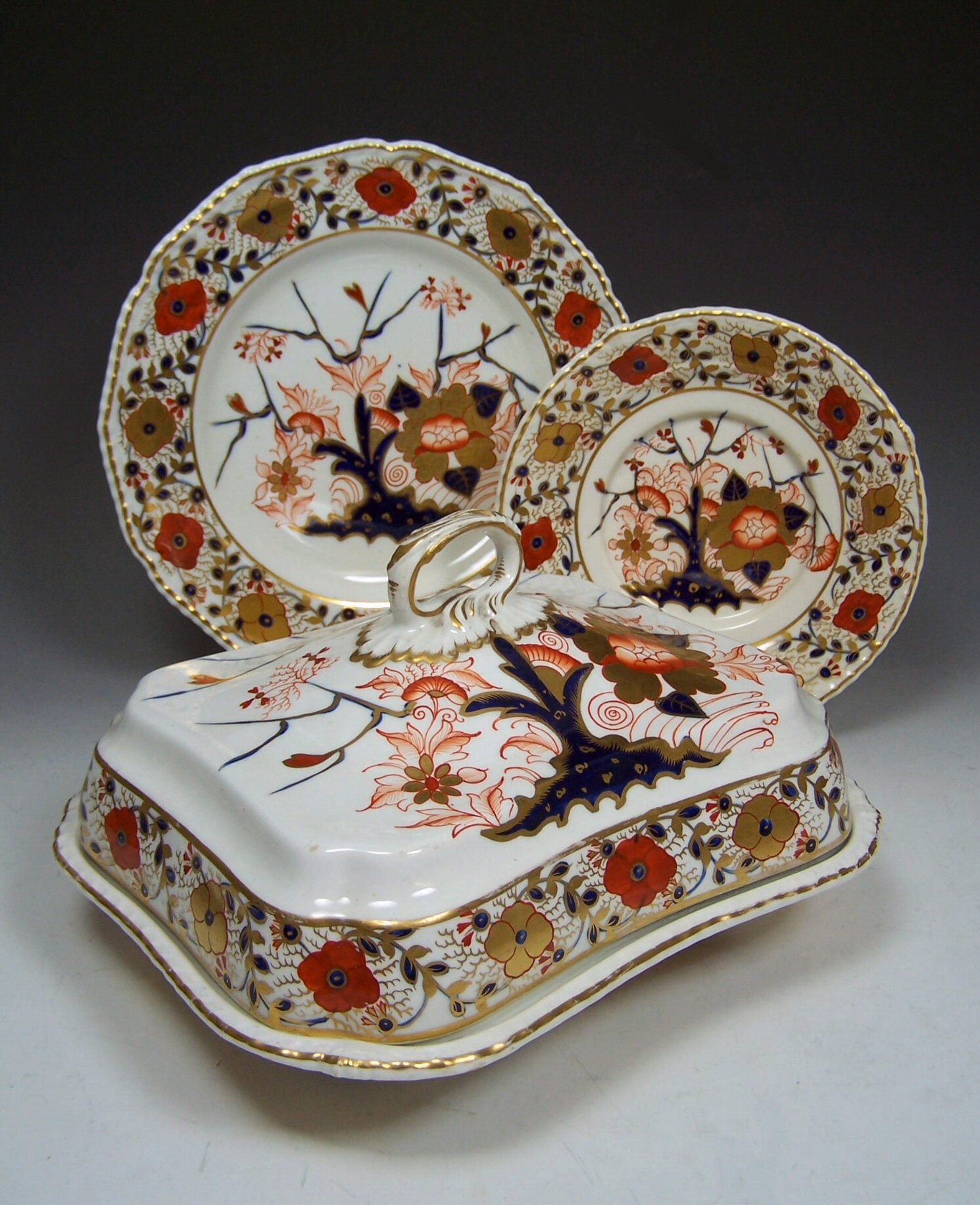 A 19th century Bloor Derby Imari palette part dinner service, circa 1820-40