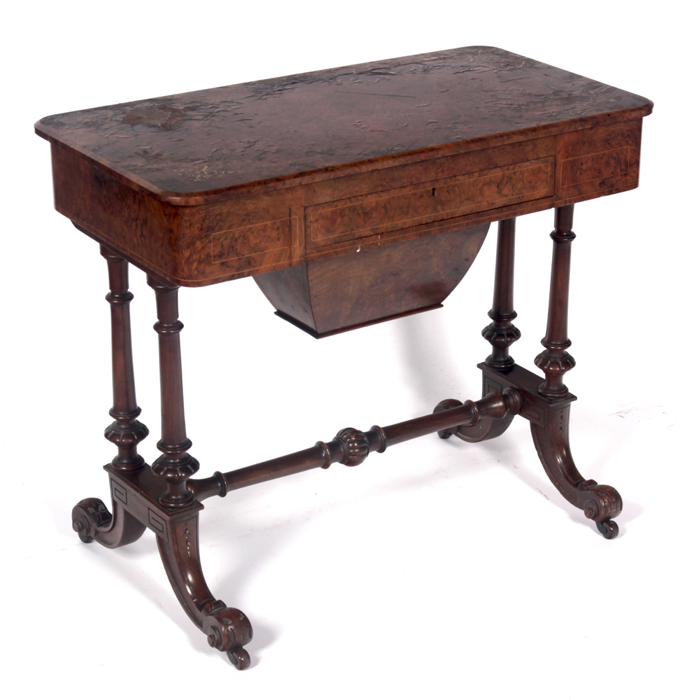 A Victorian walnut and mahogany work table By Edwards & Sons, Newcastle