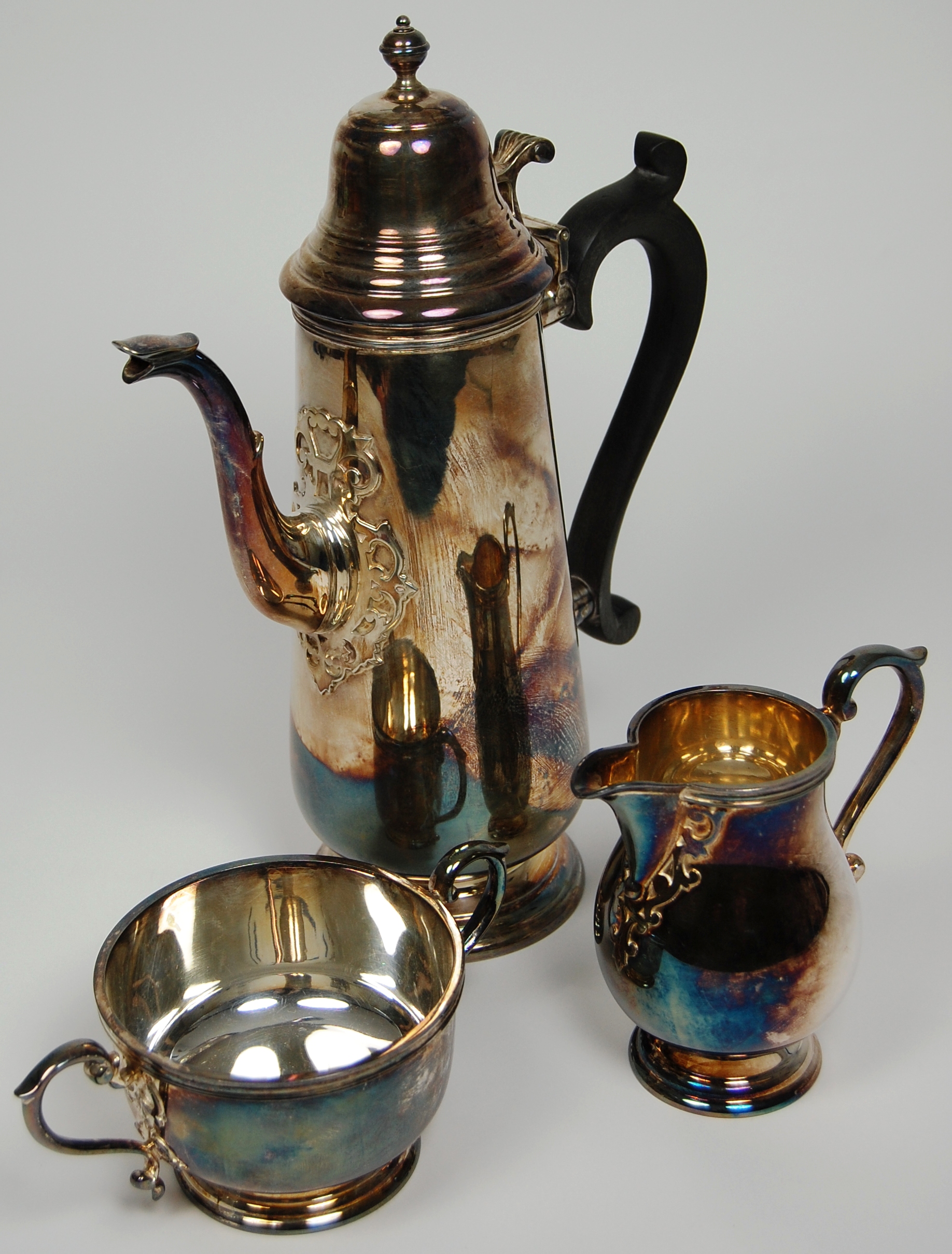 A three piece modern silver coffee set