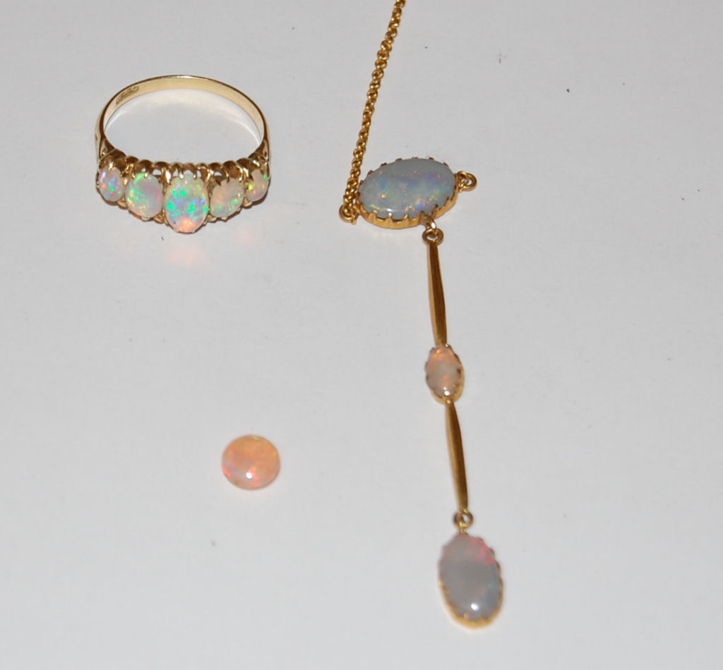An opal five-stone ring,