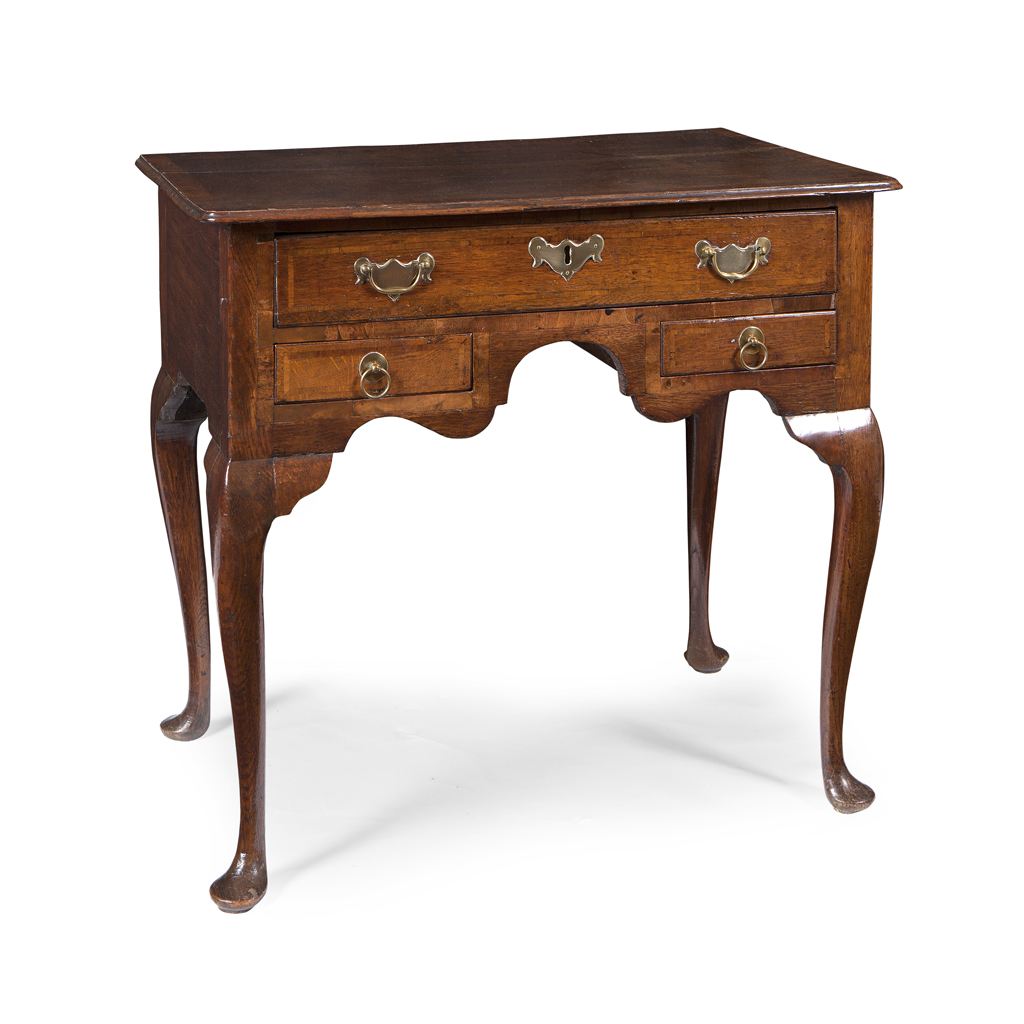 A GEORGE III OAK AND CROSSBANDED LOWBOY