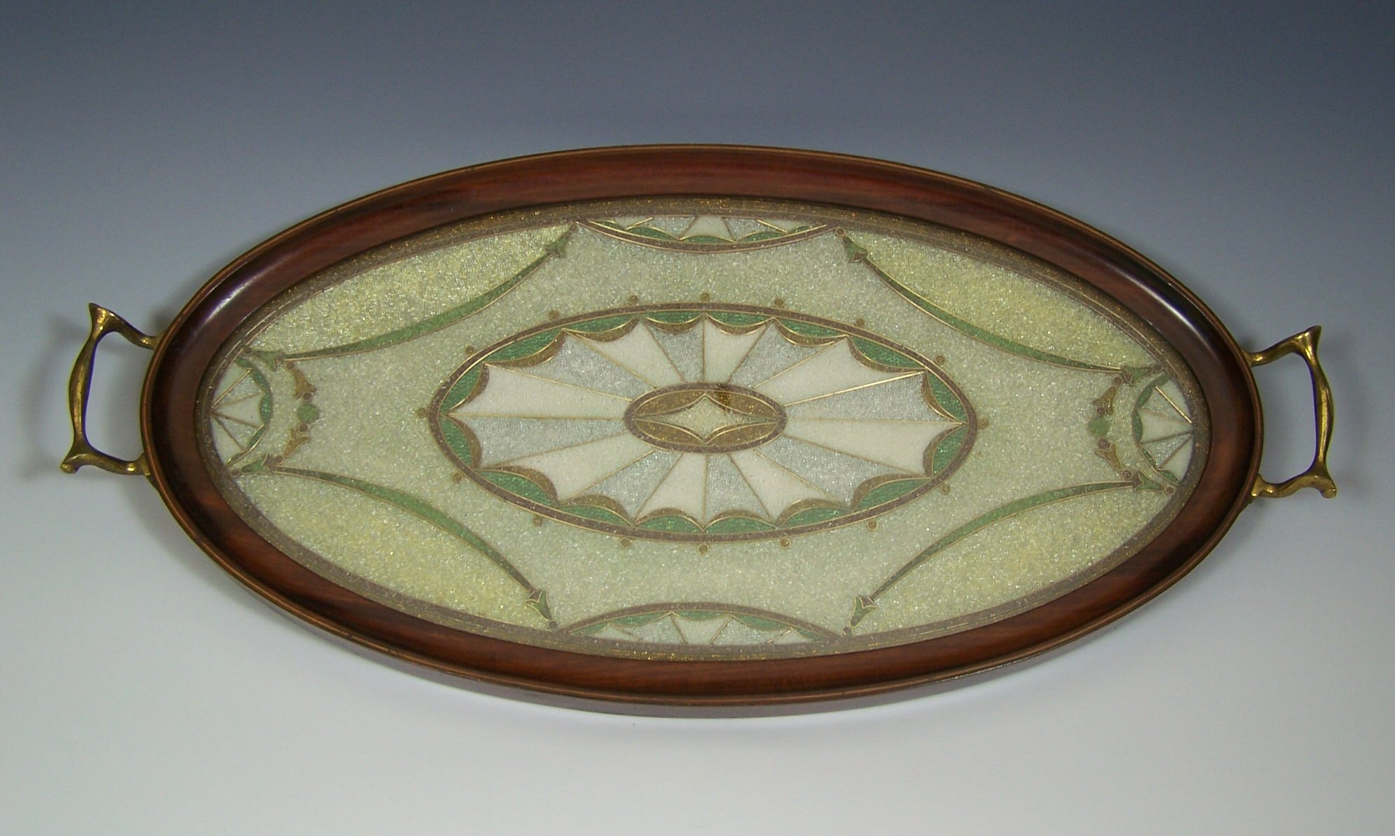 An early 20th century oval beadwork tray,