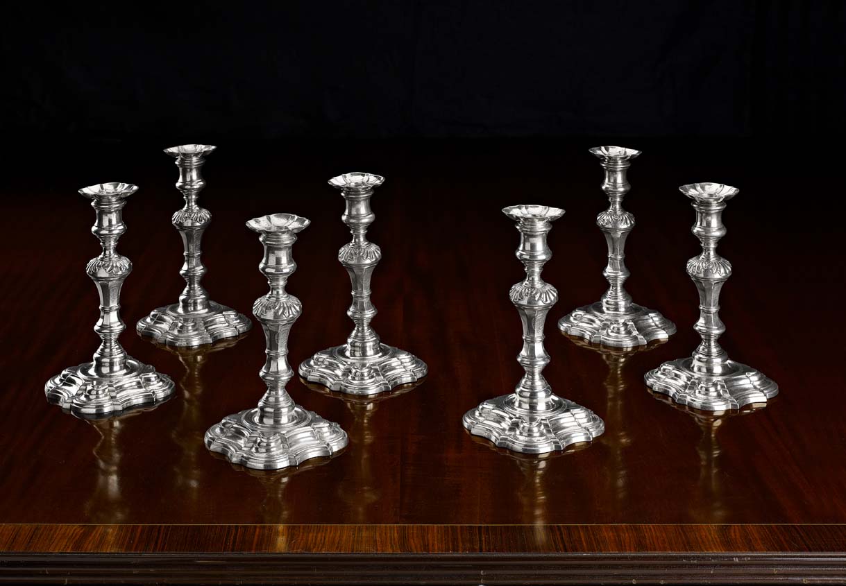 A pair of German silver Royal table candlesticks