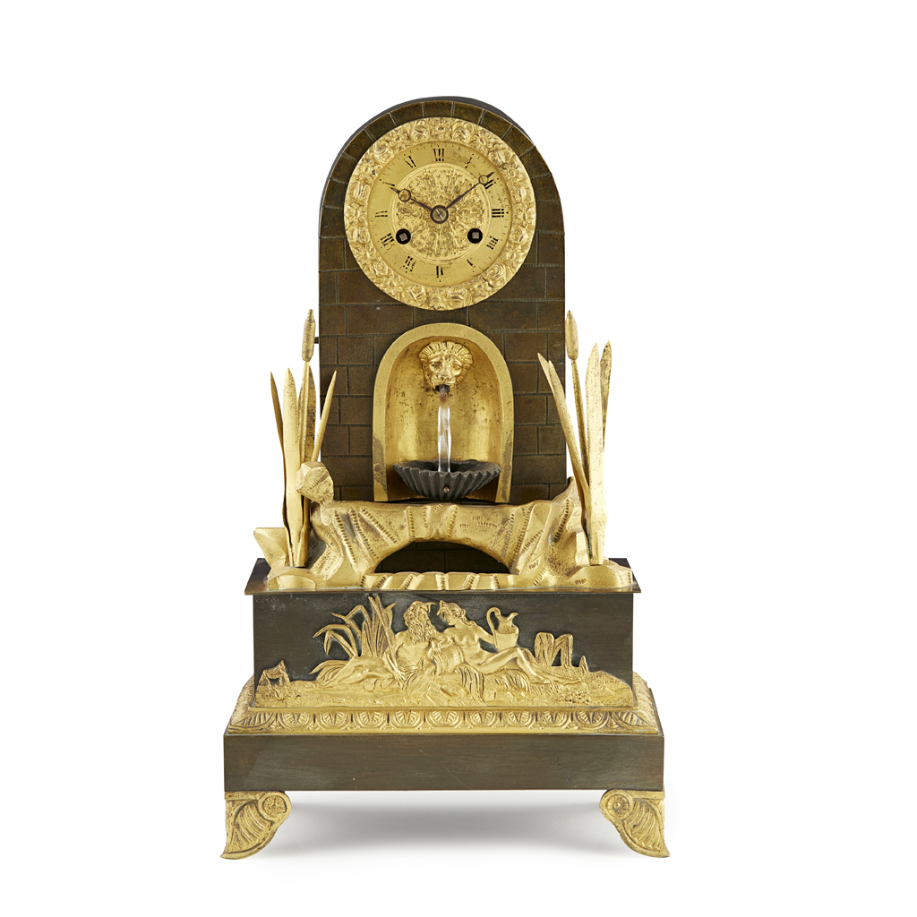 FRENCH EMPIRE GILT AND PATINATED METAL MANTEL CLOCK