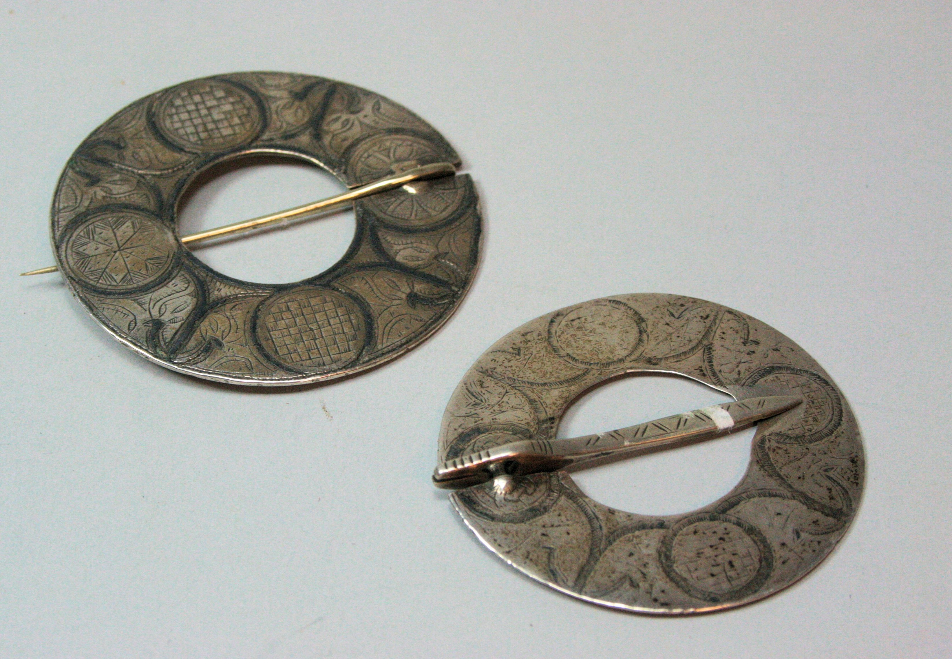 Two 18th century silver and niello plaid brooches