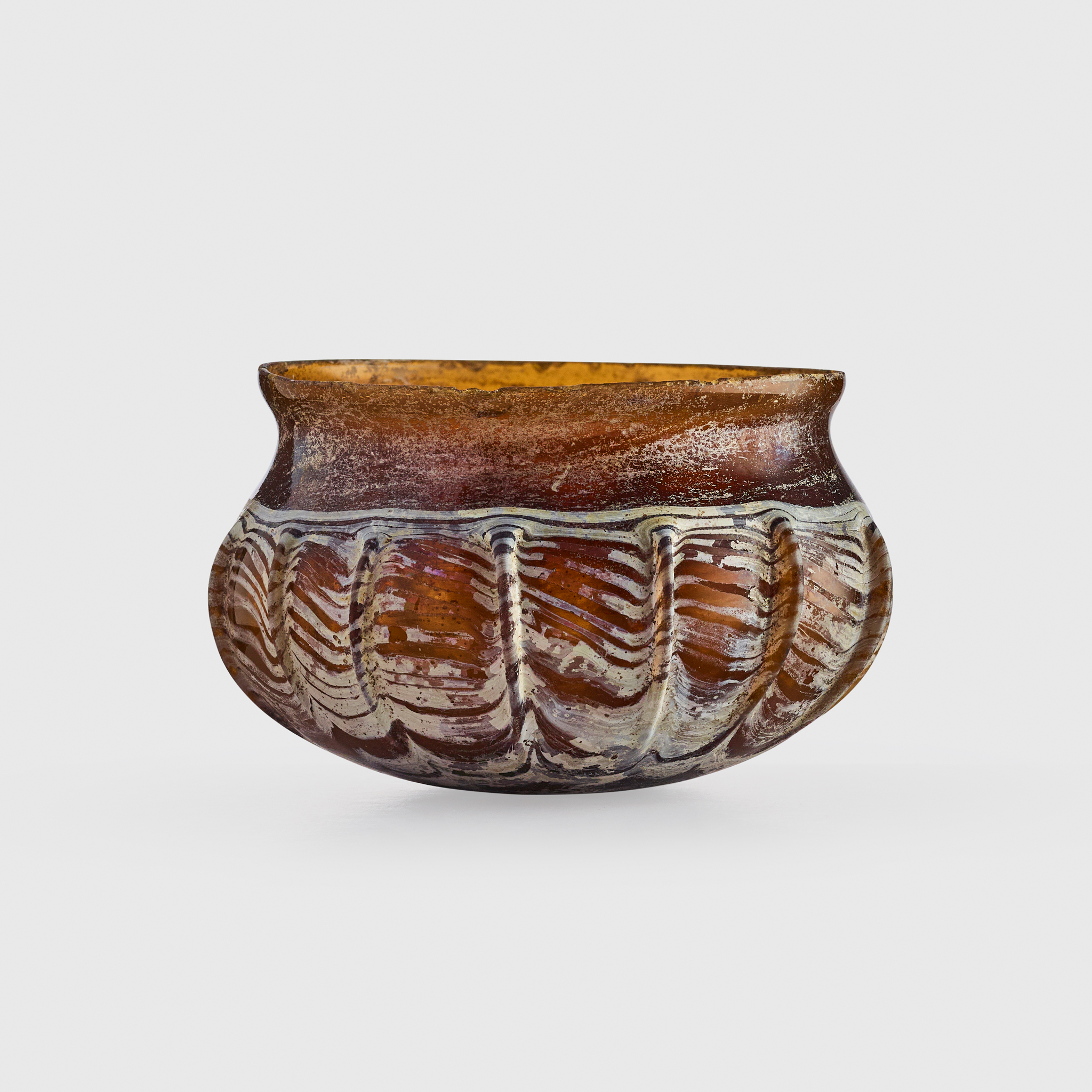 ROMAN AMBER GLASS MINIATURE BOWL