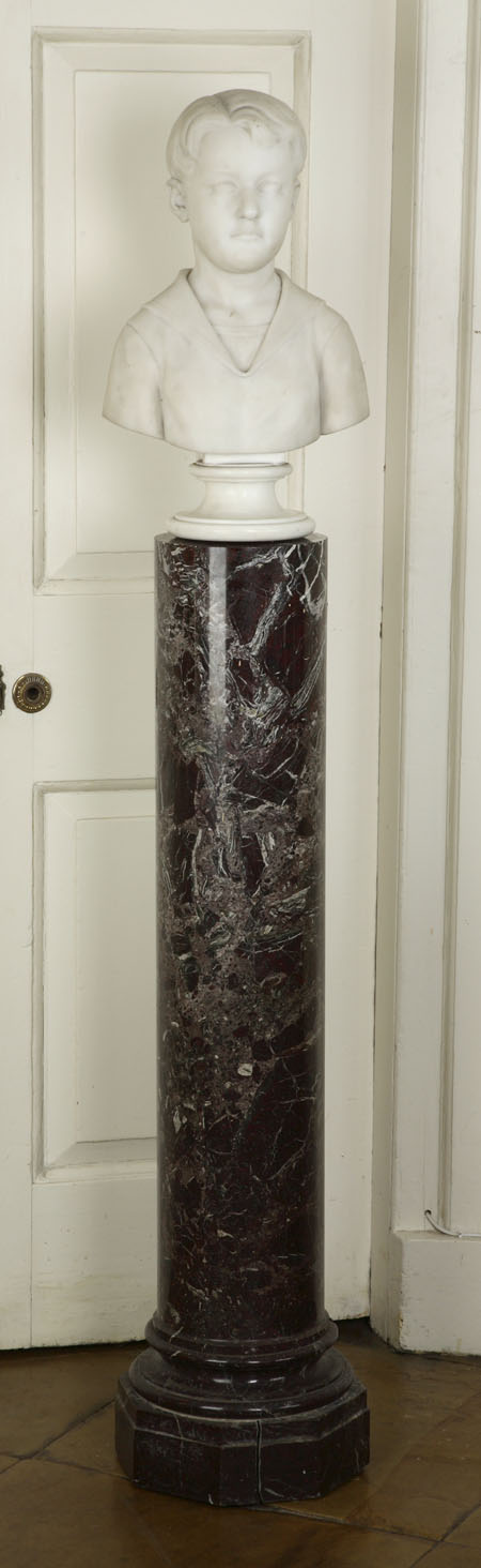 A late 19th century white marble bust of a young boy by Longworth Powers